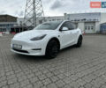 Білий Тесла Model Y, об'ємом двигуна 0 л та пробігом 49 тис. км за 32500 $, фото 1 на Automoto.ua