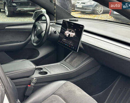 Белый Тесла Model Y, объемом двигателя 0 л и пробегом 57 тыс. км за 32000 $, фото 18 на Automoto.ua