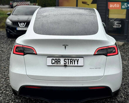 Білий Тесла Model Y, об'ємом двигуна 0 л та пробігом 62 тис. км за 27400 $, фото 59 на Automoto.ua