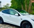 Білий Тесла Model Y, об'ємом двигуна 0 л та пробігом 56 тис. км за 25900 $, фото 1 на Automoto.ua