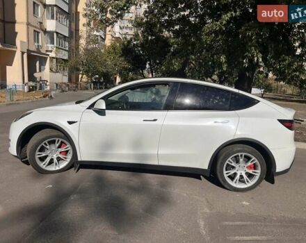 Белый Тесла Model Y, объемом двигателя 0 л и пробегом 55 тыс. км за 28000 $, фото 3 на Automoto.ua
