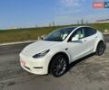 Білий Тесла Model Y, об'ємом двигуна 0 л та пробігом 61 тис. км за 22300 $, фото 1 на Automoto.ua