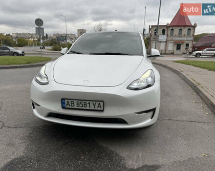 Білий Тесла Model Y, об'ємом двигуна 0 л та пробігом 82 тис. км за 25499 $, фото 1 на Automoto.ua