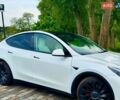 Белый Тесла Model Y, объемом двигателя 0 л и пробегом 56 тыс. км за 25900 $, фото 1 на Automoto.ua