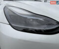 Білий Тесла Model Y, об'ємом двигуна 0 л та пробігом 82 тис. км за 25499 $, фото 27 на Automoto.ua