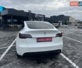 Білий Тесла Model Y, об'ємом двигуна 0 л та пробігом 100 тис. км за 23999 $, фото 6 на Automoto.ua