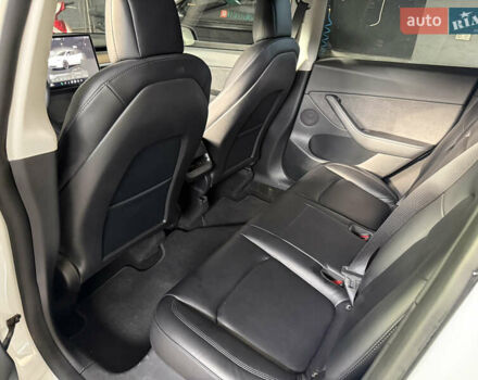 Белый Тесла Model Y, объемом двигателя 0 л и пробегом 50 тыс. км за 39900 $, фото 11 на Automoto.ua