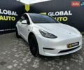 Белый Тесла Model Y, объемом двигателя 0 л и пробегом 61 тыс. км за 24700 $, фото 1 на Automoto.ua