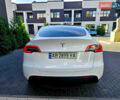 Белый Тесла Model Y, объемом двигателя 0 л и пробегом 96 тыс. км за 20000 $, фото 4 на Automoto.ua