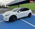 Белый Тесла Model Y, объемом двигателя 0 л и пробегом 68 тыс. км за 35000 $, фото 2 на Automoto.ua