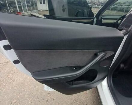 Белый Тесла Model Y, объемом двигателя 0 л и пробегом 54 тыс. км за 30000 $, фото 11 на Automoto.ua