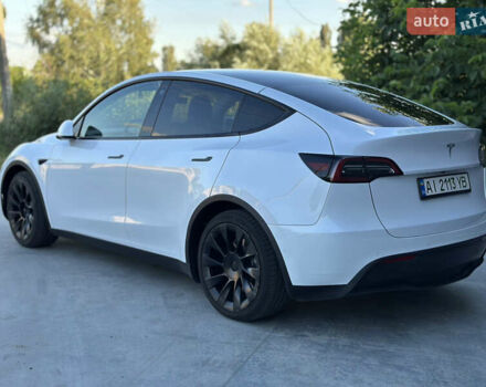 Белый Тесла Model Y, объемом двигателя 0 л и пробегом 55 тыс. км за 27999 $, фото 2 на Automoto.ua