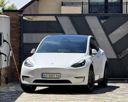 Белый Тесла Model Y, объемом двигателя 0 л и пробегом 90 тыс. км за 34999 $, фото 1 на Automoto.ua