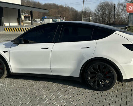 Білий Тесла Model Y, об'ємом двигуна 0 л та пробігом 63 тис. км за 28700 $, фото 11 на Automoto.ua
