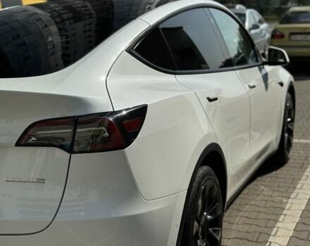 Белый Тесла Model Y, объемом двигателя 0 л и пробегом 49 тыс. км за 28000 $, фото 1 на Automoto.ua