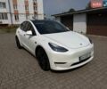Білий Тесла Model Y, об'ємом двигуна 0 л та пробігом 57 тис. км за 28700 $, фото 1 на Automoto.ua