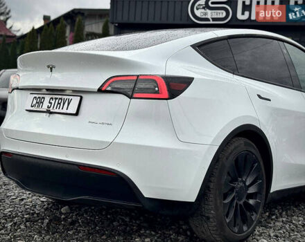 Білий Тесла Model Y, об'ємом двигуна 0 л та пробігом 62 тис. км за 27400 $, фото 51 на Automoto.ua
