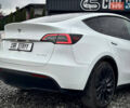 Білий Тесла Model Y, об'ємом двигуна 0 л та пробігом 62 тис. км за 27400 $, фото 51 на Automoto.ua
