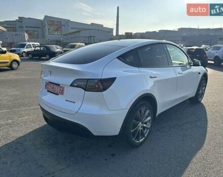 Білий Тесла Model Y, об'ємом двигуна 0 л та пробігом 61 тис. км за 22300 $, фото 5 на Automoto.ua