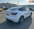 Білий Тесла Model Y, об'ємом двигуна 0 л та пробігом 61 тис. км за 22300 $, фото 5 на Automoto.ua