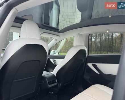 Білий Тесла Model Y, об'ємом двигуна 0 л та пробігом 117 тис. км за 23500 $, фото 31 на Automoto.ua