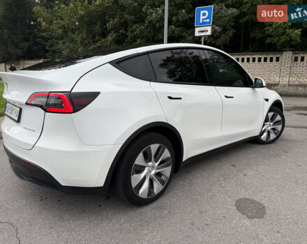 Білий Тесла Model Y, об'ємом двигуна 0 л та пробігом 82 тис. км за 25499 $, фото 5 на Automoto.ua