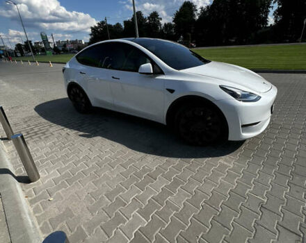 Белый Тесла Model Y, объемом двигателя 0 л и пробегом 59 тыс. км за 27999 $, фото 1 на Automoto.ua