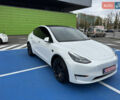 Белый Тесла Model Y, объемом двигателя 0 л и пробегом 68 тыс. км за 35000 $, фото 1 на Automoto.ua
