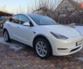 Белый Тесла Model Y, объемом двигателя 0 л и пробегом 95 тыс. км за 25999 $, фото 1 на Automoto.ua