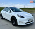 Белый Тесла Model Y, объемом двигателя 0 л и пробегом 64 тыс. км за 28500 $, фото 1 на Automoto.ua