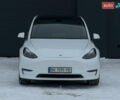 Білий Тесла Model Y, об'ємом двигуна 0 л та пробігом 104 тис. км за 24500 $, фото 1 на Automoto.ua