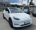 Белый Тесла Model Y, объемом двигателя 0 л и пробегом 88 тыс. км за 25500 $, фото 2 на Automoto.ua