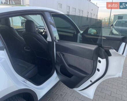 Білий Тесла Model Y, об'ємом двигуна 0 л та пробігом 60 тис. км за 24900 $, фото 25 на Automoto.ua