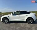 Білий Тесла Model Y, об'ємом двигуна 0 л та пробігом 61 тис. км за 22300 $, фото 2 на Automoto.ua