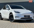 Белый Тесла Model Y, объемом двигателя 0 л и пробегом 52 тыс. км за 23800 $, фото 1 на Automoto.ua