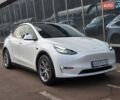 Белый Тесла Model Y, объемом двигателя 0 л и пробегом 70 тыс. км за 31500 $, фото 1 на Automoto.ua
