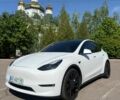 Білий Тесла Model Y, об'ємом двигуна 0 л та пробігом 59 тис. км за 28999 $, фото 1 на Automoto.ua
