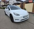 Белый Тесла Model Y, объемом двигателя 0 л и пробегом 75 тыс. км за 25000 $, фото 1 на Automoto.ua