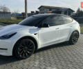 Білий Тесла Model Y, об'ємом двигуна 0 л та пробігом 63 тис. км за 28700 $, фото 25 на Automoto.ua