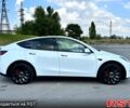 Белый Тесла Model Y, объемом двигателя 0.39 л и пробегом 64 тыс. км за 28500 $, фото 1 на Automoto.ua