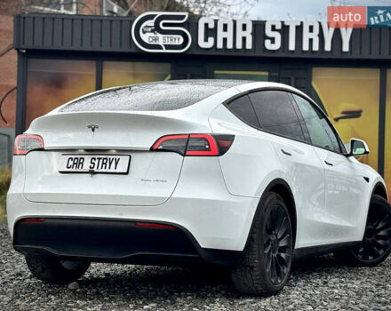 Білий Тесла Model Y, об'ємом двигуна 0 л та пробігом 62 тис. км за 27400 $, фото 49 на Automoto.ua