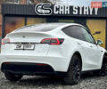 Білий Тесла Model Y, об'ємом двигуна 0 л та пробігом 62 тис. км за 27400 $, фото 49 на Automoto.ua