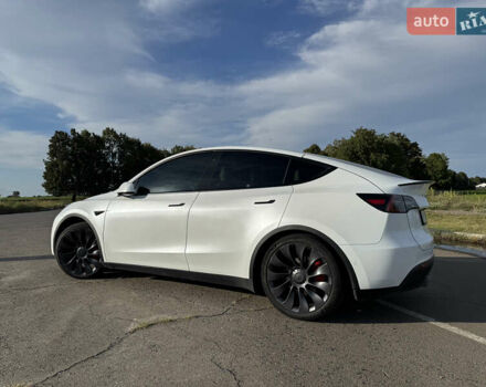 Белый Тесла Model Y, объемом двигателя 0 л и пробегом 51 тыс. км за 31000 $, фото 2 на Automoto.ua