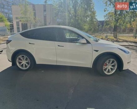 Белый Тесла Model Y, объемом двигателя 0 л и пробегом 55 тыс. км за 28000 $, фото 2 на Automoto.ua