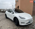 Белый Тесла Model Y, объемом двигателя 0 л и пробегом 56 тыс. км за 29000 $, фото 1 на Automoto.ua
