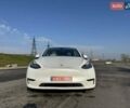 Білий Тесла Model Y, об'ємом двигуна 0 л та пробігом 61 тис. км за 22300 $, фото 3 на Automoto.ua