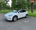 Белый Тесла Model Y, объемом двигателя 0 л и пробегом 125 тыс. км за 28000 $, фото 1 на Automoto.ua