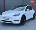 Белый Тесла Model Y, объемом двигателя 0 л и пробегом 55 тыс. км за 27999 $, фото 1 на Automoto.ua
