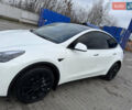 Білий Тесла Model Y, об'ємом двигуна 0 л та пробігом 52 тис. км за 25900 $, фото 1 на Automoto.ua