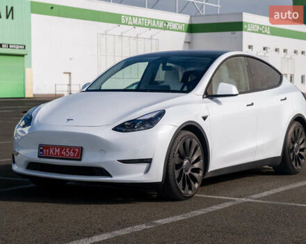 Белый Тесла Model Y, объемом двигателя 0 л и пробегом 51 тыс. км за 29500 $, фото 1 на Automoto.ua